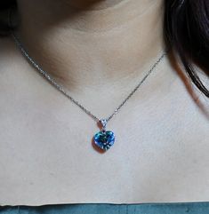 Beautiful Multifaceted Blue heart Swarovski Crystal necklace mounted on Sterling Silver 925. It is mounted on an 18-inch Sterling Silver 925 chain. You can select the size of the Adjustable Silver Chain   From 18"", 20"" & 22"" for FREE  Simply select your preferred length at checkout. Size - 1/1 inch (2.54cm height & width) Shape - Heart Colour - Blue Weight - 4.15 gram The chain is 925 Sterling Silver Please choose the length 18"", 20"", 22"" inches.  The necklace comes with a complimentary bo Blue Heart Cut Jewelry For Gift, Blue Heart-cut Necklaces With Heart Charm, Blue Heart Cut Necklaces With Heart Charm, Blue Heart Cut Necklace For Anniversary, Blue Gemstone Heart Necklace For Gift, Blue Heart Pendant Necklace With Birthstone, Blue Birthstone Heart Pendant Necklace, Blue Heart Cut Necklace For Gift, Blue Heart Pendant Jewelry Gift For Her