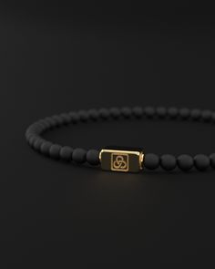 Embrace Minimalist Strength with the Onyx Matte Bracelet from the Essential Collection. This understated bracelet is crafted from 4mm AAA-grade natural Onyx Matte stones, paired with a sleek rectangular tube clasp, creating an accessory that embodies subtle strength, protection, and modern elegance. Design and Materials: Onyx Matte Stones: The bracelet features perfectly polished 4mm round Onyx Matte stones of AAA quality, known for their soft, matte black finish and grounding properties. Durabl Stacked Necklaces, Red Tigers Eye, Black Onyx Stone, Stacked Jewelry, Stackable Bracelets, Ring Pendant Necklace, Fall Jewelry, Recycled Silver, Black Rhodium