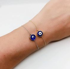 Evil Eye Bracelet is adjustable. Lenght of the Turkish Eye Bracelet is 21 cm(8.26 inches) Evil eyes are believed to protect the person who carries them. They are also believed to bring good luck and deflect the negative energy. It is believed that the eye protects from the evil spirits such as jelousy and negative energy and brins good luck.Evil eye bead bracelet is a great gift choice for Birthday, Christmas, Mother's day or Valentine's day Evil eye charm is over 5000 years old. It is found in Minimalist Blue Adjustable Beaded Bracelet, Dainty Blue Adjustable Beaded Bracelets, Dainty Adjustable Blue Beaded Bracelets, Blue Hypoallergenic Evil Eye Bracelet As Gift, Hypoallergenic Blue Evil Eye Bracelet Gift, Blue Hypoallergenic Round Bracelets, Hypoallergenic Blue Round Bracelets, Blue Hypoallergenic Bracelets, Adjustable Evil Eye Chain Bracelet Gift