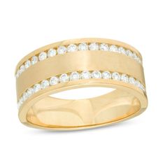 a yellow gold ring with white diamonds