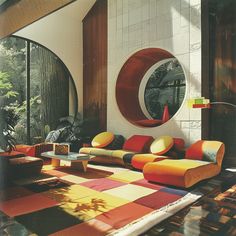 a living room filled with lots of colorful furniture