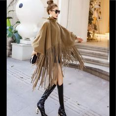 New Fringe Benefits Long Sleeve Turtleneck Poncho - Camel One Size - Fits Most Material: Polyester Colors: Black, Khaki Neckline: Turtle-Neck Closure: Front Zipper Decoration: Fringe Pattern: Solid Color I Own This Dress It Up Or Down Five Star Rated! Ships 2 Weeks Enjoy! Black Jacket Women, Mantel Cape, Poncho Coat Cape, Tassel Jacket, Mode Mantel, Turtleneck Poncho, Poncho Coat, Coat Women Fashion, Capes For Women