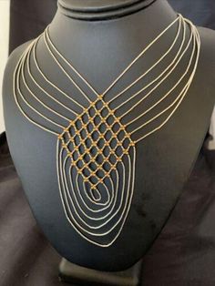 * The Necklace has beautiful Sterling Silver Heishi beads and Gold Filled Beads Cascading down and strung in 7 Strands, With a unique design it adds a Gorgeous Style to the Necklace. * Length 18" drops down to 28" * Strands 7 * Made in USA   Free Returns or Replacements within 30 Days of Purchase with tags intact. Please let us know the problem before posting a bad feedback. Fast, Free and Guaranteed Shipping Please contact seller for any questions and concerns. We hope you have a great experience with us and hope for an awesome review. Adjustable Gold Beads Necklace, Artisan Gold Necklaces With Spacer Beads, Unique Gold Beaded Necklaces With Spacer Beads, Artisan Gold Necklace With Spacer Beads, Unique Gold Necklaces With Polished Beads, Artisan Gold Beaded Necklaces With Spacer Beads, Bohemian Gold Necklace With Polished Beads, Bohemian Beaded Yellow Gold Jewelry, Bohemian Yellow Gold Beaded Jewelry