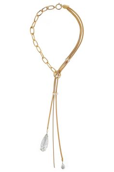 The Precious Drop Necklace in Gold offers a distinctive and stylish appearance, making it the ideal addition to any evening look. Wear it with a plunging necklace and complementary items from the same collection for an elegant combination. Made in Italy Crystals Pearls Bronze Metal 18K Gold Plated Necklace Length, 18" + 2" Extension Luxury Lariat Chain Necklace For Evening, Elegant Dangle Clavicle Chain Necklace, Gold Elegant Lariat Necklace For Evening, Luxury Metal Necklace With Detachable Pendant, Elegant Gold Necklace With Detachable Pendant, Luxury Long Necklace With Jewels, Elegant Snake Chain Jewelry For Formal Occasions, Elegant Snake Chain Necklaces For Wedding, Elegant Long Necklace With 17 Jewels