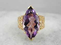 Elegant Amethyst Marquise Ring, Elegant Marquise Amethyst Ring, Elegant Purple Marquise Jewelry, Elegant Purple Amethyst Ring With Filigree, Elegant Purple Amethyst Ring With Intricate Design, Luxury Purple Diamond-cut Jewelry, Formal Amethyst Ring With Intricate Design, Elegant Purple Amethyst Filigree Ring, Formal Purple Amethyst Ring With Filigree