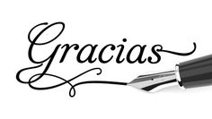 the word gracias written in cursive writing with a fountain pen