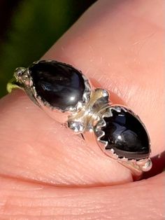 Black Onyx Ring Happiness Black Onyx is a powerful protection stone. It can transmute negative energy and aids in the development of emotional and physical strength. Black Onyx can be used to encourage happiness and good fortune. This stone helps one to become the master of their own fate. Sterling Silver Ring is a size 6. Black Gemstone Rings For Healing, Spiritual Black Rings, Black Spiritual Rings With Gemstone, Black Spiritual Gemstone Rings, Black Spiritual Round Rings, Black Spiritual Ring Jewelry, Black Obsidian Gemstone Ring, Black Spiritual Jewelry For Anniversary, Spiritual Black Jewelry For Anniversary