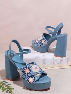 Floral Beauty: Women's Blue High Heel Sandals with Floral Pattern Desi Light Blue Round Toe Sandals For Summer, Summer Platform Sandals With Fabric Material, Light Blue Sandals For Spring Party, Chic Fabric Heels For Summer, Chic Summer Fabric Heels, Light Blue Party Sandals For Spring, Summer High Heel Fabric Sandals, Summer Fabric Ankle Strap Sandals, Summer Fabric Sandals With Block Heel