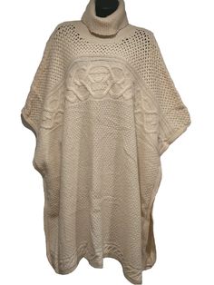 This charming and versatile Ralph Lauren Womens Wool Blend Poncho is a must-have for any fashion-forward woman. The creamy ivory color and cable knit pattern give it a timeless and elegant feel, making it suitable for various occasions such as travel, parties, formal events, workwear, and business meetings. The pullover style and relaxed fit make it comfortable to wear, while the turtleneck neckline adds a touch of sophistication. Crafted from a luxurious blend of wool, alpaca wool, and wool, this sweater is perfect for winter, fall, and spring. It comes with short sleeves and features a colorful theme with a slit in two sides and sleeveless design. The size is XL, suitable for regular size types, and the brand is Lauren Ralph Lauren. Get ready to stand out and make a fashion statement wit Cable Knit Pattern, Knit Pattern, Alpaca Wool, Ralph Lauren Womens, Ivory Color, Knit Patterns, Lauren Ralph Lauren, Pullover Styling, Cable Knit