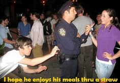 a police officer talking to a girl in front of a group of people with the caption just keep talking charmingly