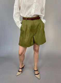 "Linen Summer Shorts for Women Size XXS - XXL | High Waisted, Pleated Olive Linen Short Pants with folded hem and belt loops. Composition: 100% linen Measurement of the linen summer shorts: length: 45 cm | 17.7\" inseam: 13 cm | 5.1\" Please see the last picture for the chart size. Regarding the length, if you wish a custom one, please message me when you order. These linen bermuda shorts are size S and they were photographed on a size S model: bust: 90 cm|35.4\", waist: 70|27.5\" cm, hips: 90 c Olive Wide Leg Bottoms For Summer, Olive Bottoms With Pockets In Short Length, High Waist Green Bottoms With Belt Loops, Khaki Pants With Belt Loops Short Length, Khaki Pants With Belt Loops And Short Length, Green Short Bottoms For Work, Green Workwear Shorts With Belt Loops, Green Bottoms With Short Inseam For Workwear, Casual High Waist Olive Bottoms