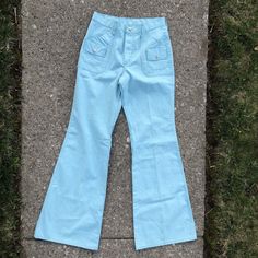 Vintage mint condition Maverick light blue bell bottom pants.  Snap button  Excellent vintage condition with no flaws found  Measurements taken laying flat  Waist 28  Hips 38  Rise 11  Inseam 34  Leg opening 12 Retro Wide Leg Light Wash Flare Jeans, Retro Blue Flare Jeans With Pockets, Retro Light Wash Pants With Pockets, Retro Light Wash Cotton Flare Jeans, Vintage Light Wash Wide Leg Flare Jeans, Retro Light Wash Flare Jeans With Pockets, Retro Light Wash Cotton Pants, Retro Light Wash Pants, Retro Blue Cotton Flare Jeans