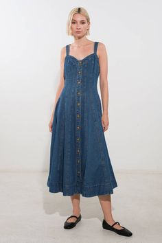 A washed denim midi dress featuring sweetheart neckline, straps, button down and A line skirt Details: Self : 100% Cotton Size & Fit - Model is 5`8" And Wearing Size Small- Measurements Taken From Size Small- Approx. Length: 50" Denim A Line Dress, Dress Like A Grandma, Curvy Maxi Dress, Autumn Dresses, Glamorous Fashion, What To Wear Fall, Big Rangoli, Dress Illustration, Skirt Details