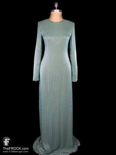 "BIG NEWS After 23 years, our website, TheFROCK.com, has had a makeover. Check out the new site, and join our mailing list for new arrivals.  Vintage 1970s Norman Norell glass bugle beaded teal georgette evening gown. Long sleeve, georgette lined, rear zip. Measures bust 34.5\", waist 27.5\", length 62\", and sleeve length 27\". Condition is excellent.  Layaway is available. ALL DELIVERY DATES mentioned by Etsy are ESTIMATES, no delivery date or range is guaranteed, though most of our orders arr Long Embellished Evening Dress, Long Sequined Maxi Dress For Evening, Long Maxi Dress With Sequins For Evening, Glamorous Long Evening Gown, Embellished Long Evening Gown, Long Embellished Evening Gown, Evening Gown Long Sleeve, Norman Norell, Red Carpet Couture