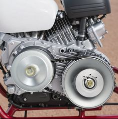 a close up view of the engine on a motorcycle