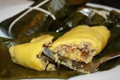 a close up of a plate of food with some type of wrapper on it