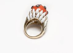 David Webb Ring.Vintage 18K yellow gold, coral round brilliant cut diamond and enamel ring by David Webb. Size 7. Signed David Webb, 18K. David Webb Jewelry Formal Enamel Ring With Gemstone, Oval Enamel Ring In Fine Jewelry Style, White Enamel Ring For Formal Occasions, Formal White Enamel Gemstone Ring, Art Deco Round Enamel Jewelry, Art Deco Enamel Round Jewelry, Vintage Diamond Enamel Round Ring, Vintage Round Diamond Enamel Ring, Fine Jewelry Collectible Enamel Ring