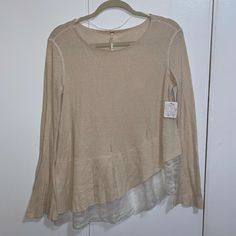 Free People Brand New Sweater/Tunic With Asymmetrical Lace Trim And And Bell Sleeves Distressed Fabric Nwt Brand New Never Worn Ivory/Cream Color Size M Beige Blouse For Fall Layering, Beige Blouse For Layering In Fall, Beige Tops With Asymmetrical Hem For Spring, Neutral Long Sleeve Knit Top For Spring, Fall Layering Tops With Asymmetrical Hem, Fall Tops For Layering With Asymmetrical Hem, Fall Tops With Asymmetrical Hem For Layering, Cream Tops For Layering In Fall, Beige Asymmetrical Hem Top For Spring