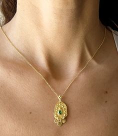 Boho gold necklace 9k 14 k Solid gold necklace with green emerald May birthstone, Yellow gold necklace, Delicate Pendant, Gift for her This solid gold necklace has a rustic textured and is set with a natural green emerald. The pendant has a delicate granulation all around it. This pendant is delicate but has a lot of character, and will upgrade any outfit you'll wear, for everyday use, as for special occasions The pendant can be ordered without the chain too. An excellent choice for anniversary Fine Jewelry Gold Emerald Necklace With Delicate Chain, Gold Emerald Necklace With Delicate Chain, Fine Jewelry, Dainty Gold Emerald Necklace With Delicate Chain, Gold Dainty Emerald Necklace, Dainty Gold Emerald Round Necklace, Gold Plated Emerald Necklace As A Fine Jewelry Gift, Gold Gemstone Necklace For May Birthstone, Gold Emerald Necklace With Delicate Chain For Gift, 17 Jewels Gold Plated Emerald Necklace As Gift