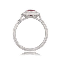 A 1.55ct ruby with deep blue saturation rests in the center of a handcrafted platinum ring. The ring showcases a halo of diamonds and openwork filigree under the gallery. ✦ WHAT COMES IN THE PACKAGE: - Diamond Engagement Ring - Quality Ring Box - Jewelry Cleaner ✦ WHY SHOP WITH US: - We've been in business for 40+ years - All of our rings are handcrafted and include high-quality natural diamonds - We offer 14-Days full refund returns - FREE insured overnight shipping (and FREE Return Shipping) - Luxury Oval Ruby Diamond Ring, Gia Certified Oval Ruby Ring, Oval Ruby Jewelry With Brilliant Cut For Weddings, Exquisite Oval Ruby Ring Gia Certified, Luxury Oval Ruby Birthstone Ring, Luxury Oval Ruby Ring With Center Stone, Luxury Oval Diamond Ring With Lab-created Ruby, Luxury Ruby Ring With Oval Center Stone, Luxury Platinum Ruby Ring With Center Stone