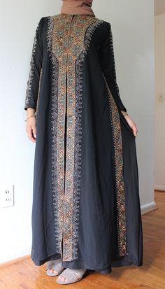 Black Muslim Abaya long sleeve, long dress with brown details on the chest, sleeve and down the entirety of the dress.  Dress it up for a special day such as Eid, Nikkah or Walima; or simply dress it down for the mosque, party or gathering.  Please feel free to check out the rest of our store for more dresses and reach out to us for any questions! Dress For Eid, Long Sleeve Long Dress, Muslim Abaya, Sleeve Long Dress, Party Outfits For Women, Simply Dress, Eid Dresses, Silver Spring, Party Outfits