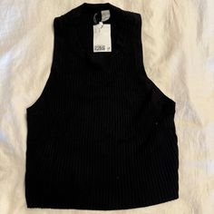 H&M Divided Black Ribbed Sweater Tank. Size: Xl. Crew Neck. New With Tags Ribbed Crop Top For Winter Night Out, Ribbed Crop Top For Night Out In Winter, Casual Black Crop Top For Winter, Black Ribbed Crop Top For Fall, Black Sleeveless Crop Top For Fall, Winter Black Ribbed Crop Top, Black Knit Crop Top For Winter, Winter Black Ribbed Top, Fall Black Ribbed Tops