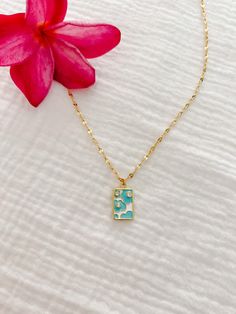 This is for 1 gold plated Teal Flowers Necklace on a 16" chain + 2" extender Width of charm is around .33" and height is just under 0.75" To keep your jewelry in its shining condition, for best use do not wear in water/sweat/salt water & handle with care :) Teal Necklace, Teal Flowers, Handle With Care, Salt And Water, Flower Necklace, In Water, Salt, Gold Plate, Plating