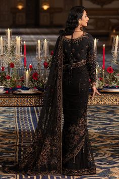 Elegant Pakistani Wedding Dress in Classic Black Shade Net Saree features handcrafted adda embellishments, thread embroidery, and sequins, hanging drapes and cut-out details on the sleeves, and handcrafted tassels on the back. Detailed Description: SKU: WB418 Detailing: Embroidery, Motifs, Naqshi, Sequins, Tilla Color: Black Fabric: Net, Tissue, Cotton Silk Design: Fully Embellished Dress with Embroidery, Goldwork Event: Bridal wear, Wedding Embroidery Goldwork, Hanging Drapes, Wedding Dresses Pakistani, Desi Wedding Dresses, Silk Design, Pakistani Wedding Outfits, Dress With Embroidery, Pakistani Wedding Dress, Asian Countries