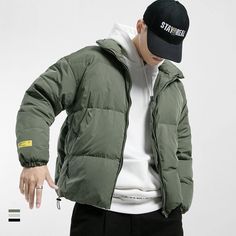 Warm Hooded Jacket For Winter Streetwear, Winter Windproof Puffer Jacket For Streetwear, Khaki Winter Outdoor Outerwear, Winter Khaki Outdoor Outerwear, Winter Outdoor Khaki Outerwear, Green Puffer Outerwear For Winter, Khaki Long-sleeve Puffer Jacket For Cold Weather, Green Puffer Winter Outerwear, Green Winter Puffer Outerwear