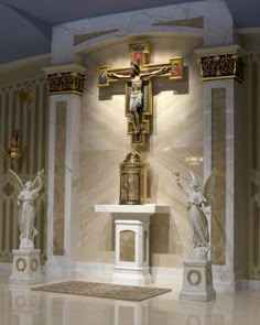 a statue of jesus on the cross in a church