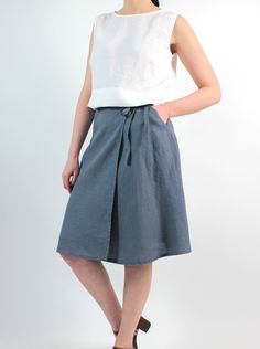 Grey linen wrap short skirt with pockets, loose linen nnee length casual skirt, MaTuTu Linen Style Casual Linen Asymmetrical Skirt, Casual Linen Wrap Skirt For Spring, Casual Asymmetrical Linen Skirt, Relaxed Cotton Knee-length Wrap Skirt, Relaxed Knee-length Cotton Wrap Skirt, Knee-length Cotton Wrap Skirt, Relaxed Linen Asymmetrical Wrap Skirt, Linen Pleated Skirt, Summer Linen Asymmetrical Wrap Skirt