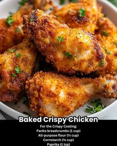 baked crispy chicken in a white bowl with parsley on top and text overlay