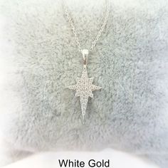 - North Star pendant necklace is made with high quality 14K real solid gold including the chain. - North Star necklace has decorated with white zirconia stones. - This charm, dainty , delicate and trendy north star necklace has been artfully designed for timeless fashion. - You receive north star jewelry in a beautiful and free gift box. - Free shipping (Arrive within 4 business days to USA and Canada ( 1 day for production+3 days for shipment)) - This 14K solid gold north star necklace is a per White Star Of David Jewelry For Anniversary, Diamond White Star Of David Jewelry Gift, White Star-shaped Diamond Jewelry, Diamond White Jewelry With Star Charm For Gift, Sterling Silver Necklaces With White Star Charm, White Sterling Silver Necklace With Star Charm, White Gold Star Charm Necklace For Anniversary, Star-shaped Diamond White Necklace For Anniversary, White Star Of David Jewelry Gift