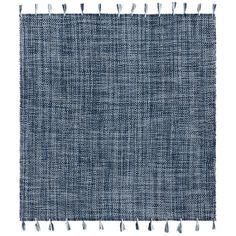 a blue rug with fringes on it