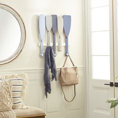 This rack easily goes with vanilla and pastel-painted walls. This item ships in 1 carton. Wood wall hook makes a great gift for any occasion. Easily hanging using hanging hook on the back; nails and screws are not included. Suitable for indoor use only. Maximum weight limit is 20 lbs. This is a single wall hook. Coastal style. Grayson Lane 5-Hook 23.25-in x 26-in H Blue 5 Hangers Decorative Wall Hook (20-lb Capacity) | 35886 Beach House Entryway, Nautical Themed Bedroom, Wall Hook Rack, Wooden Canoe, House Entry, Lake House Interior, Decorative Wall Hooks, Hook Rack, Nails And Screws