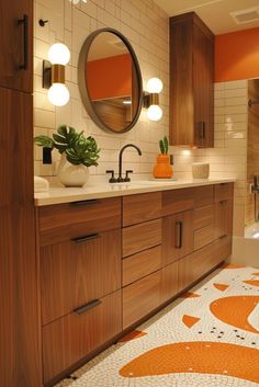 a bathroom with orange and white tiles on the floor, wooden cabinetry, and round mirror