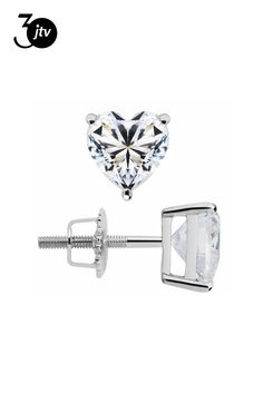 Bella Luce�� white diamond simulant 1.50ctw heart shaped, 14k white gold heart studs with velvet gift box. Meaures approximately 0.19" L x 0.19" W and has screwback backings. The diamond equivalent weight is 0.90ctw. Valentine's Day Round Cut Cubic Zirconia Diamond Earrings, Gia Certified Heart Cut Sterling Silver Jewelry, Valentine's Day Round Cut Diamond Earrings With Prong Setting, Silver Heart Cut Diamond Earrings With Vvs Clarity, Valentine's Day Heart Cut Diamond Earrings With Prong Setting, Heart Cut Diamond Earrings With Prong Setting, Classic Heart-shaped Diamond Earrings With Vvs Clarity, Valentine's Day Cubic Zirconia Diamond Earrings In Prong Setting, Valentine's Day Cubic Zirconia Diamond Earrings