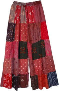 This fresh style for summer is chic, boho, unrestricted and so enviro-friendly with its recycled patchwork design.  The overdye color is bright rose red and certainly with some darker black, nay and green - all unique in every piece. #tlb #SplitSkirtsPants #Patchwork #Floral #Printed #bohemianfashion #Handmade #HippiePants #PatchworkPants #GypsyPants #Widelegrayonpants Bohemian Patchwork Pants For Spring, Traditional Patchwork Pants For Summer, Pink Bohemian Bottoms For Festival, Red Patchwork Bottoms For Summer, Traditional Patchwork Bottoms For Spring, Bohemian Floral Patchwork Bottoms For Festival, Traditional Block Print Bottoms For Summer, Bohemian Multicolor Bottoms For Festival, Multicolor Bohemian Bottoms For Festival