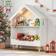 a christmas tree is next to a white shelf with presents on it and a red lantern in the corner