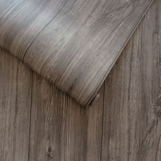 a close up view of a wooden floor with wood grains on the top and bottom