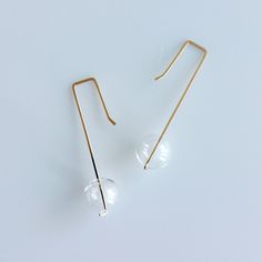 Minimalist Glass Dangle Jewelry, Minimalist Glass Earrings For Gift, Minimalist Clear Drop Earrings, Minimalist Clear Dangle Earrings, Minimalist Wire Wrapped Earrings For Everyday, Clear Minimalist Dangle Earrings, Minimalist Wire Wrapped Long Drop Earrings, Minimalist Glass Jewelry With Ear Wire, Minimalist Long Drop Wire Wrapped Earrings