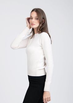 Pure cashmere yarn is crafted in an accentuating silhouette and enhanced with rib-knit edges, resulting in a sophisticated piece destined to become a wardrobe staple. 7 gauge Regular fit Handcrafted in Italy Crew Neck Cashmere Knit Top For Workwear, Cashmere Knit Top For Work, Classic Crew Neck Knit Top With Ribbed Collar, Classic Knit Top With Ribbed Crew Neck, Classic Knit Top With Ribbed Collar And Crew Neck, Cashmere Crew Neck Knit Top For Work, Cream Cropped Crew Neck Sweater With Ribbed Cuffs, Winter Cashmere Sweater With Ribbed Neckline, Crew Neck Cropped Sweater For Work