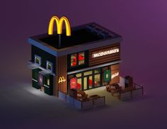 a mcdonald's restaurant with neon lights on the front