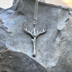 The Antler Cross Christian Pendant is crafted in sterling silver, making it a meaningful piece of jewelry for farm and ranch Christian men, ideal for Father's Day or as a hunting gift for him, all made in the USA. 🔵𝗗𝗘𝗧𝗔𝗜𝗟𝗦 𝗔𝗡𝗗 𝗦𝗧𝗢𝗥𝗬 Made in the USA ⚫️Material: Nickel-free Sterling Silver (.925) ⚫️Size: Appx 1.5 inches x 1 inch This exclusive Bradley Kellie pendant design was created in-house. The pendant is small batch hand cast (hand-poured sterling, utilizing the lost-wax metho Silver Rustic Jewelry Gift, Rustic Silver Jewelry Gift, Rustic Silver Jewelry For Gift, Rustic Sterling Silver Jewelry In Silver, Rustic Silver Necklace For Gift, Rustic Nickel-free Silver Necklace, Mens Christian Gifts, Cross Pendant Men, Christian Men