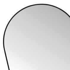 an oval shaped mirror with black trim around the edges and bottom edge, on a white background