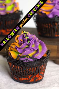 halloween cupcakes with purple frosting and sprinkles on the top