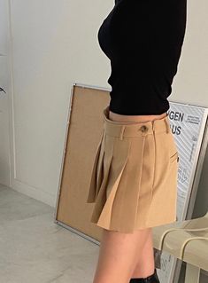 Details This skort is featured in low rise, pleats with pants inside. ● Pleats with wrapped ● Side zipper ● Pants inside ● Low rise Care Hand Wash Cold Model size 5'2" waist (25"-26") model is wearing S Product Info Size: S, M Color: Beige, Grey, Black Fabric: 97% polyester, 3% spandex [Our Policy] Exchange/refund are available within 7 days after receiving the product(s). Exchange/refund are not available for any worn product(s) or products damaged by customers. Please understand ivory and whit Pleated Short Bottoms For Fall, Fall Pleated Short Bottoms, High-waisted Pleated Hem Bottoms For Work, High Waist Bottoms With Pleated Hem For Work, Fall Pleated Short Length Skort, High Waist Fitted Bottoms With Pleated Hem, Pleated Short Leg Workwear Bottoms, Casual Pleated Shorts For Fall, Fall Pleated Short Skirt