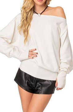 Feel the warmth of this slouchy off-the-shoulder sweater designed with thumbhole cuffs and ribbed trim. Off-the-shoulder neck Long sleeves with thumbhole cuffs 100% acrylic Hand wash, dry flat Imported Slouchy Sweater With Ribbed Cuffs For Spring, Casual Ribbed Off-shoulder Top For Fall, Casual White Off-shoulder Top For Fall, Off-shoulder Sweater For Spring, White Off-shoulder Fall Sweater, Oversized Off-shoulder Winter Top, Spring Sweater With Ribbed Cuffs And Drop Shoulder, Drop Shoulder Sweater With Ribbed Cuffs For Spring, Oversized Off-shoulder Fall Sweater