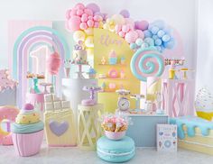 an assortment of pastel decorations and balloons