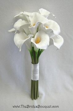 a bouquet of white flowers in a vase